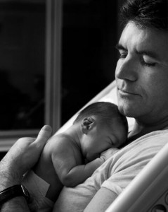 Cowell states he is enjoying being involved in all aspects of his son's young life. 