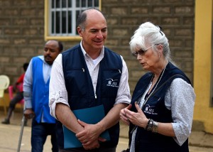 Singer/songwriter Emmylou Harris and JRS/USA National Director Armando Borja discuss what they have seen at the UNHCR Refugee Children Residential, Learning and Recreational Center in Endabaguna, Ethiopia, about 20 kilometers from the city of Shire, June 7, 2016. (Christian Fuchs — Jesuit Refugee Service/USA)