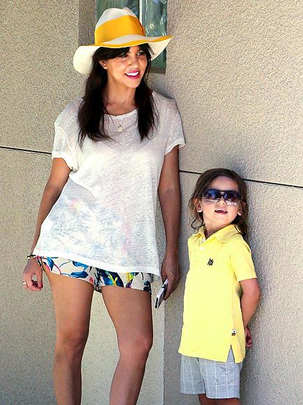Kourtney Kardashian and Mason chill out while donning summery attire. Wonder if Kim will follow Kourtney’s parenting style?