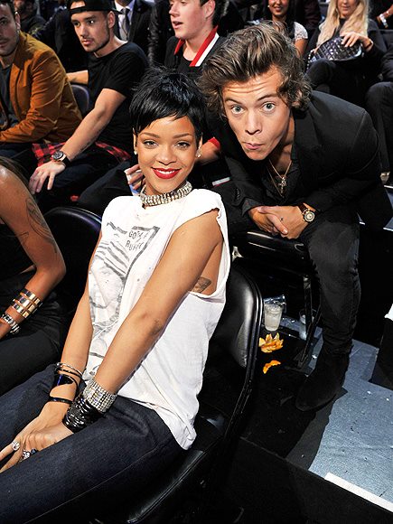 Rihanna and Harry Styles strike a pose! Fans, caption this VMA snapshot!