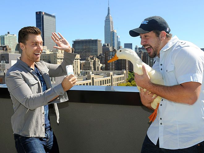 ‘NSYNC’s Lance Bass and Joey Fatone clown around with a duck. Fans, caption this…