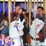 David Beckham is in full daddy mode while snapping pictures of his kids at Disneyland. Cute, cute, cute!