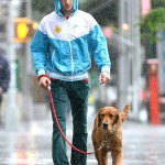 Andrew Garfield and his canine companion get drenched while out on a walk. Good thing his spidey senses told him to wear a jacket...