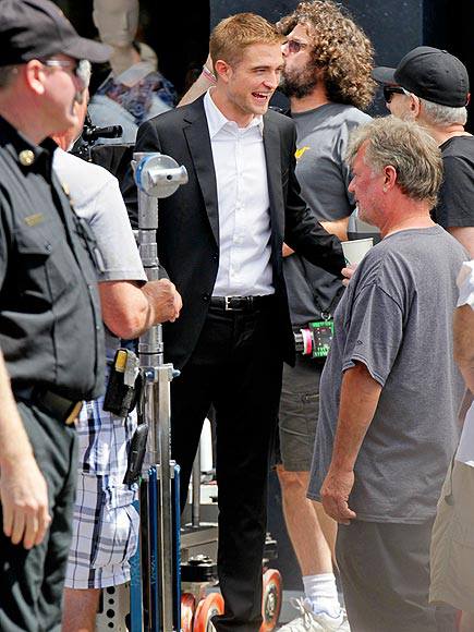 Robert Pattinson gets silly during the filming of ‘Map to the Stars.’ He seems like a guy with a decent sense of humor…