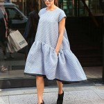 Victoria Beckham steps out in one of her own designs. I don't know about this one... she reminds me of a doll with an oversized dress....