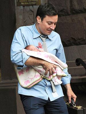 Funnyman Jimmy Fallon cradles his sweet newborn baby girl, Winnie Rose. SO CUTE!