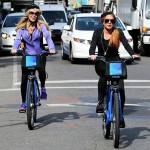 Dina and Lindsay Lohan do something really normal and drama-free... riding bikes. Of course Lindsay is livin' on the edge with no helmet. 
...