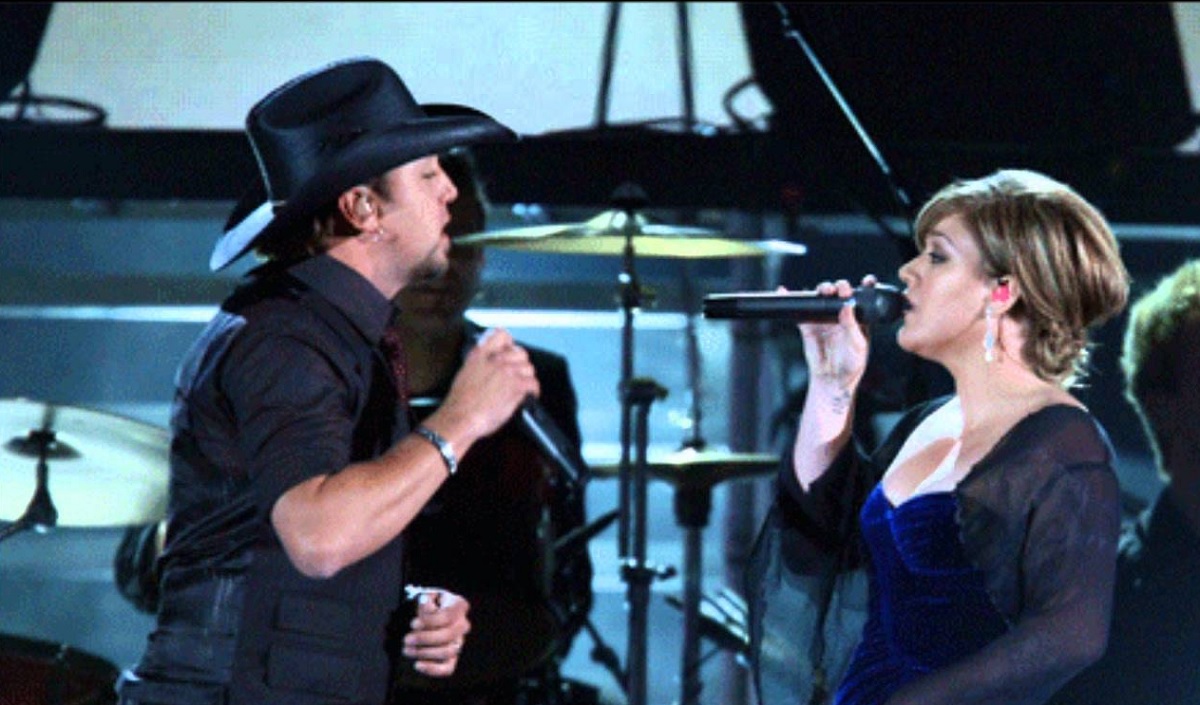 This powerful duet by Kelly Clarkson and Jason Aldean became a hit on both the Pop and Country music charts . . . [Video]