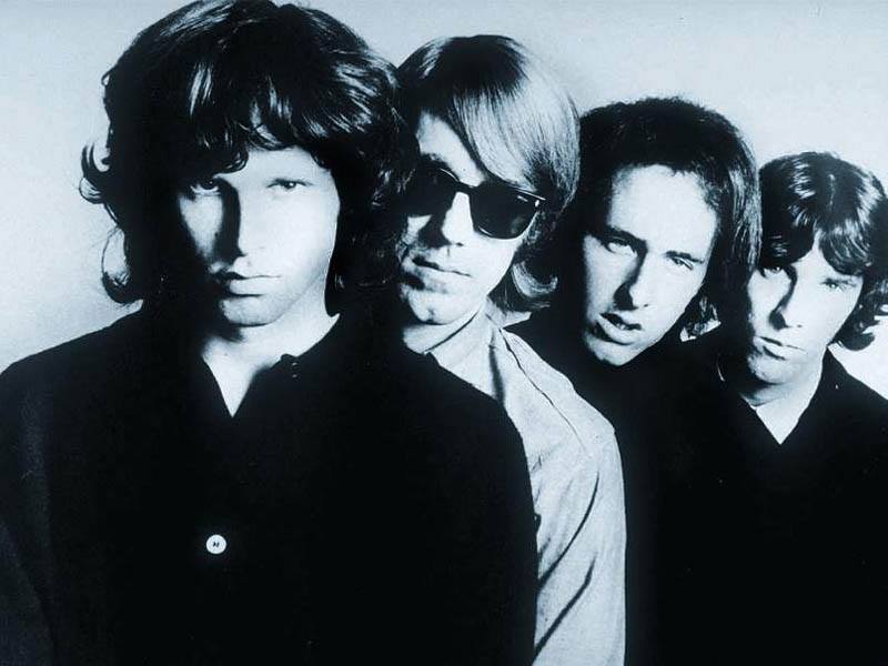 The Doors surviving members John Densmore and Robby Kreiger took the stage Dec. 5 for the first time in 15 years to play a brief four song