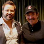 Kix Brooks and Randy Houser have debuted a music video for ‘High in the Saddle ,’ a song the pair collaborated on for the film ‘Ambush