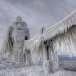 See how the ocean waves make art as they freeze on these light houses in the winter!