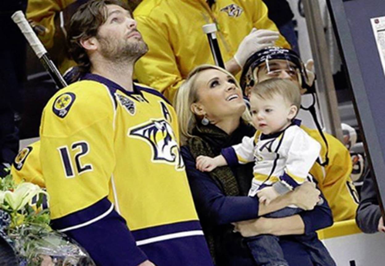 carrie underwood and mike fisher with isaiah